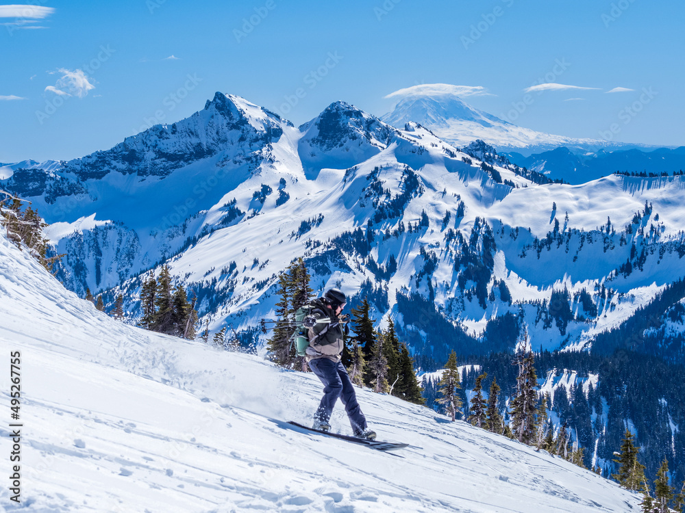Backcountry snowboarding on the slopes of Mount Rainier
