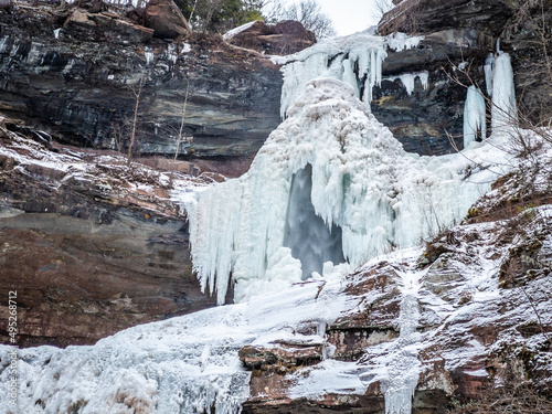 Frozen Kaaterskill Falls in winter Catskill mountains photo