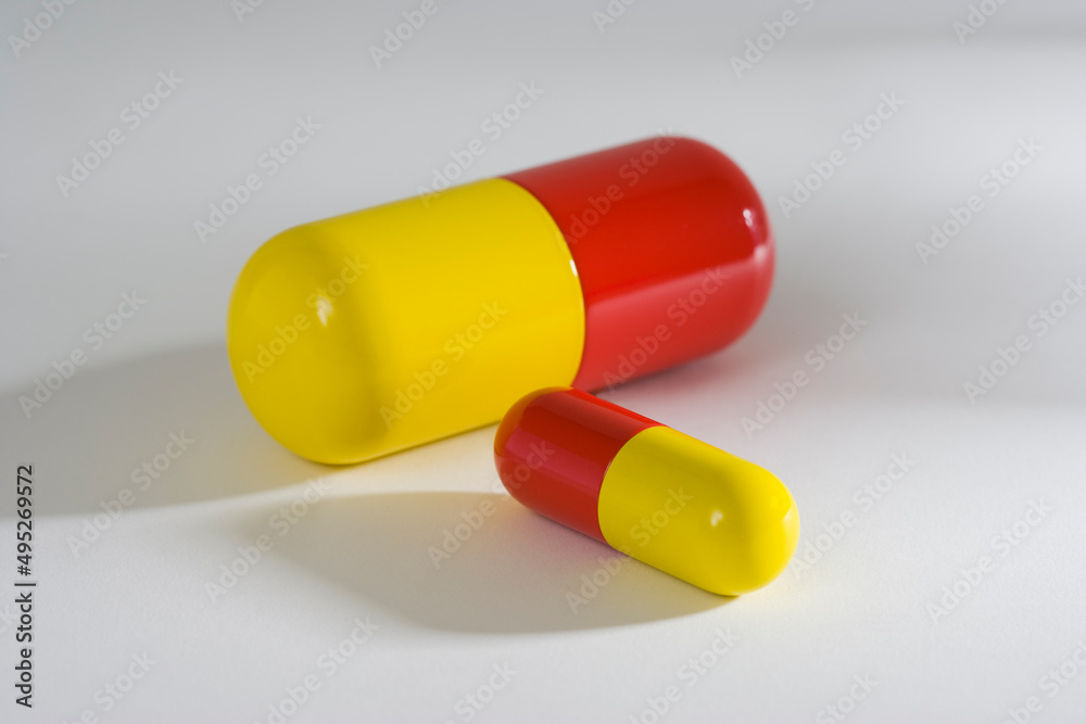 Medicine capsule on w white surface Medicine capsule on w white surface