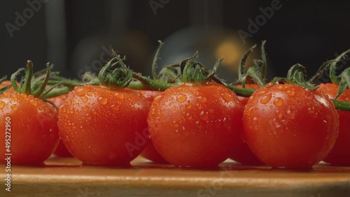 Fresh tomatoes with drops of water