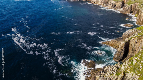 Waves crashing on the rocks of the coast Aerial view