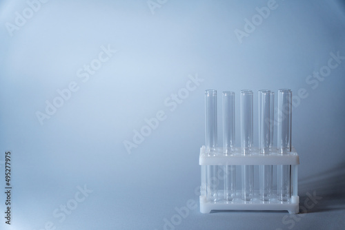 Close up view of transparent glass test tubes for biological research.Isolated on background. Laboratory tests and research.Chemistry science or medical biology experiment.Laboratory background