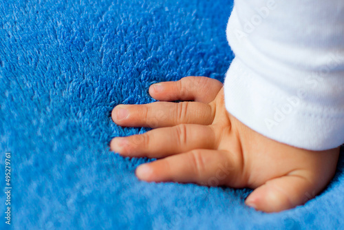 Child's hand on the veil