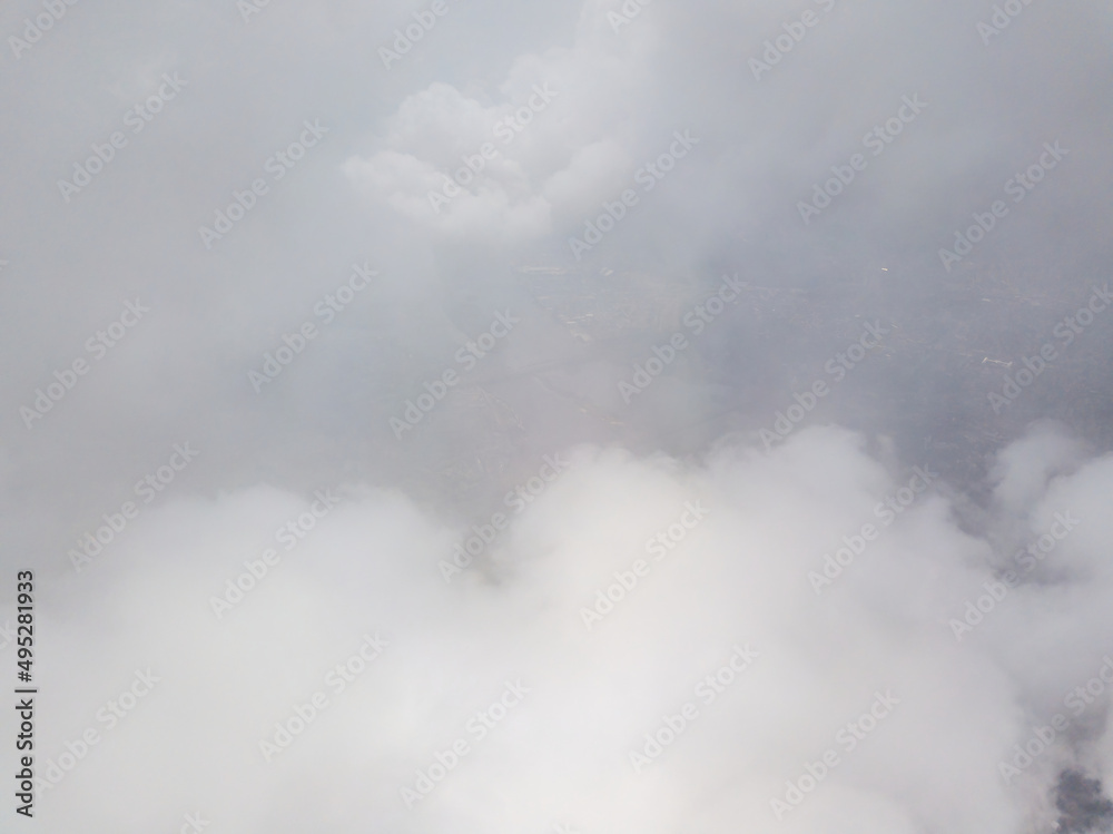 High flying in the clouds. Aerial drone view.