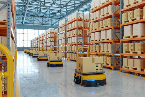 AGV (Automated guided vehicle) in warehouse logistic and transport. photo