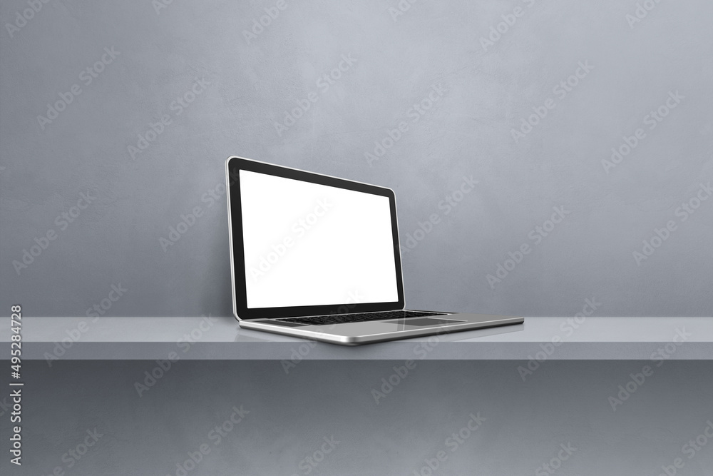 Laptop computer on grey shelf background