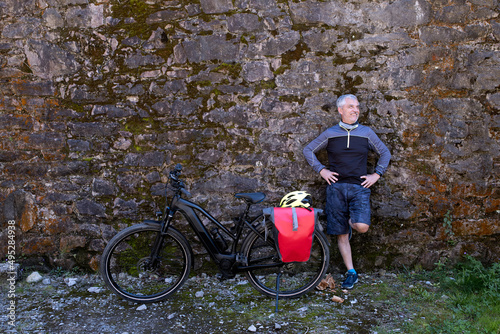 Mature man with his bike