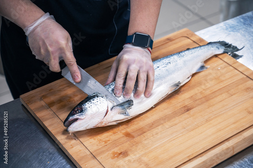 Chef preparing a salmon fis...