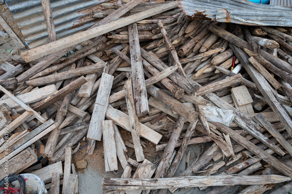 Scrap wood left over from building a house. Scrap wood left over from building a house.