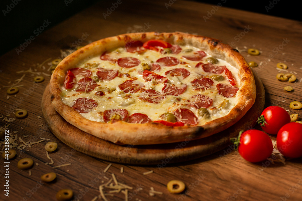 delicious italian pizza served on wooden table