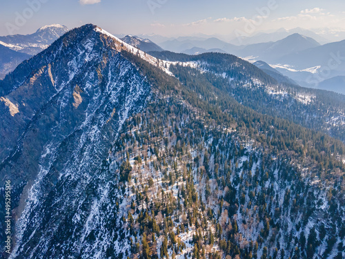 Jochberg mountain top view during winter with a wide view along to the Karvendel alp chain