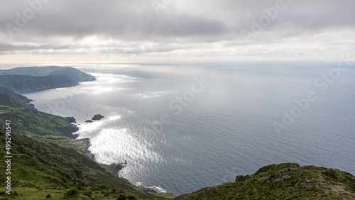 Landscape of the sky, the mountain and the sea on a cloudy day