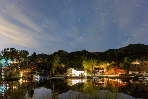 Night view of the Malibu Lake with stars © Kit Leong