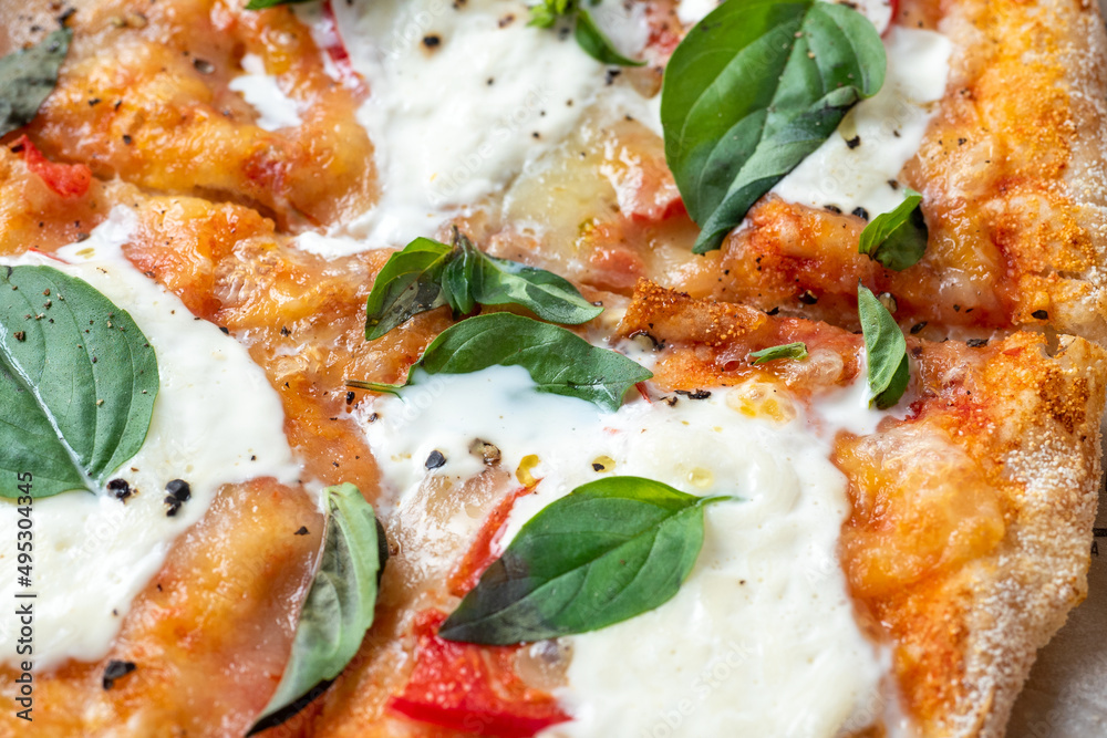 Close-up of fresh hot Roman pizza with herbs and cheese. Italian pizza, food, fast food, macrophoto, selective focus Close-up of fresh hot Roman pizza with herbs and cheese. Italian pizza, food, fast food, macrophoto, selective focus