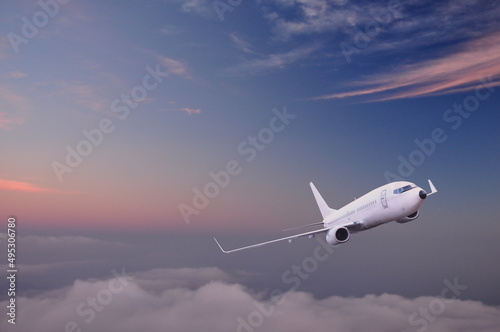 Passenger Airplane in the sky. Airliner - Aircraft. Passenger Airplane high in the sky, Airliner - Aircraft above the clouds.