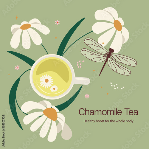 Mug of herbal tea among the chamomile flowers.