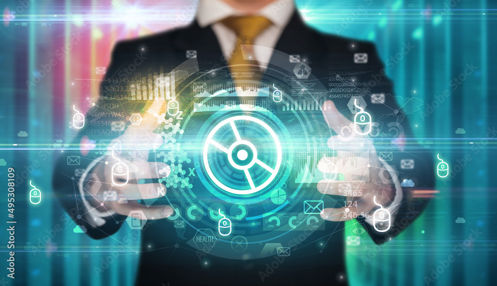 Businessman holding technology icon concept Businessman holding technology icon concept