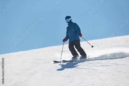 Skiing in the winter snowy slopes