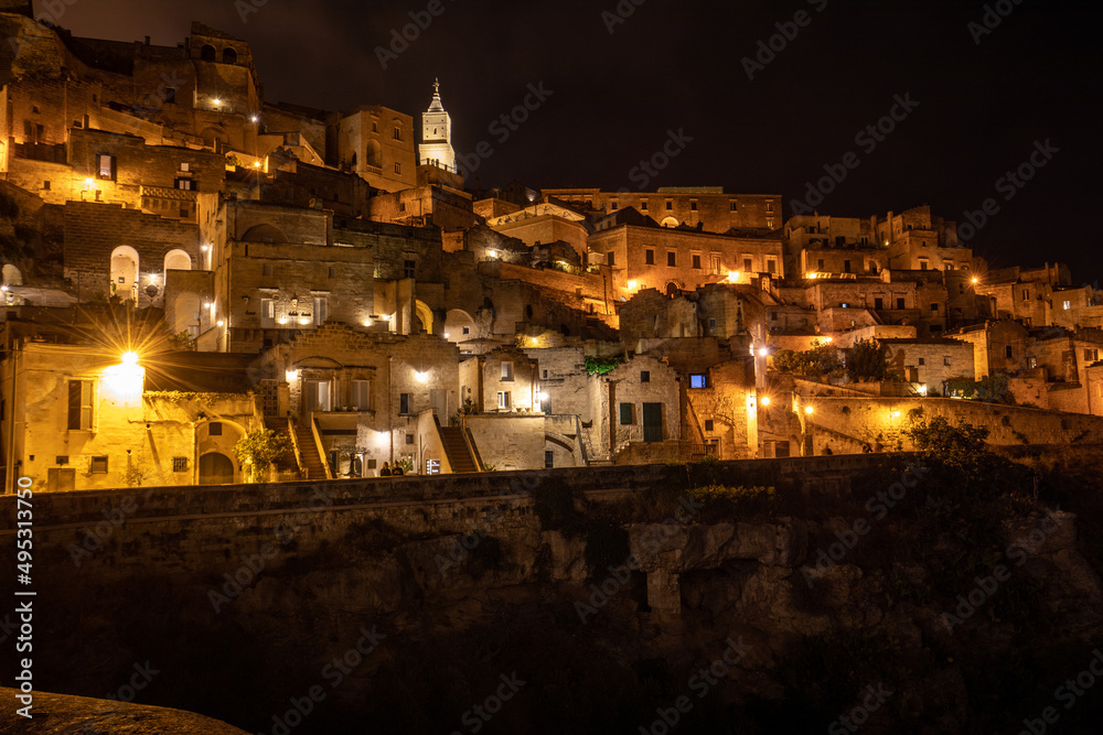  Night landscape of the Sassi of Matera a historic district iin the city of Matera well-known for their ancient cave dwellings. Basilicata. Italy