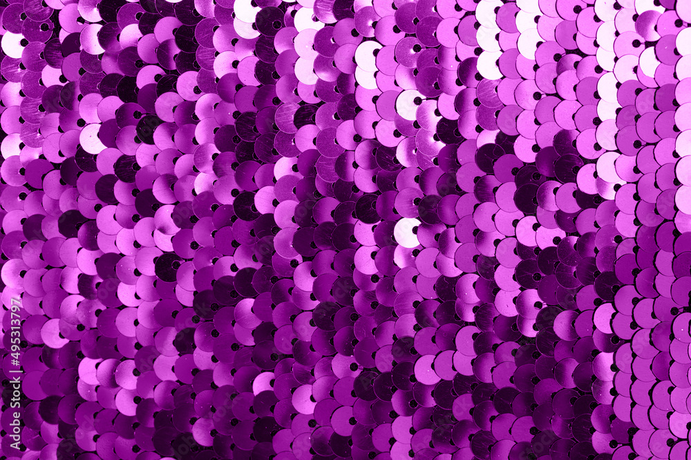 Foto de Background of fabric with sequins. A close-up shot of a shiny