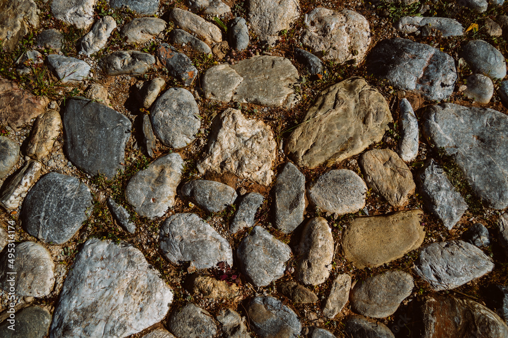 Texture of a stone wall. Old castle stone wall texture background. Stone wall as an abstract background or texture. Part of a stone wall, for background or texture