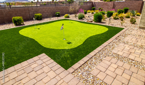 Three Hole Putting Green In Rear Yard Setting