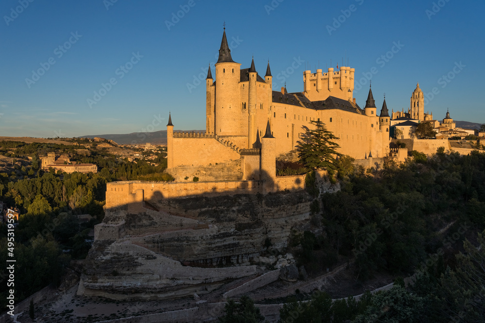 View of the Alcazar fortress of segovia at sunset, listed world Heritage centre by UNESCO