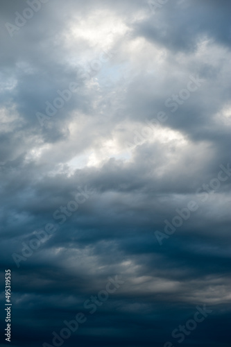 Stormy skies with dramatic clouds from approaching thunderstorms at sunset © Андрей Иванов
