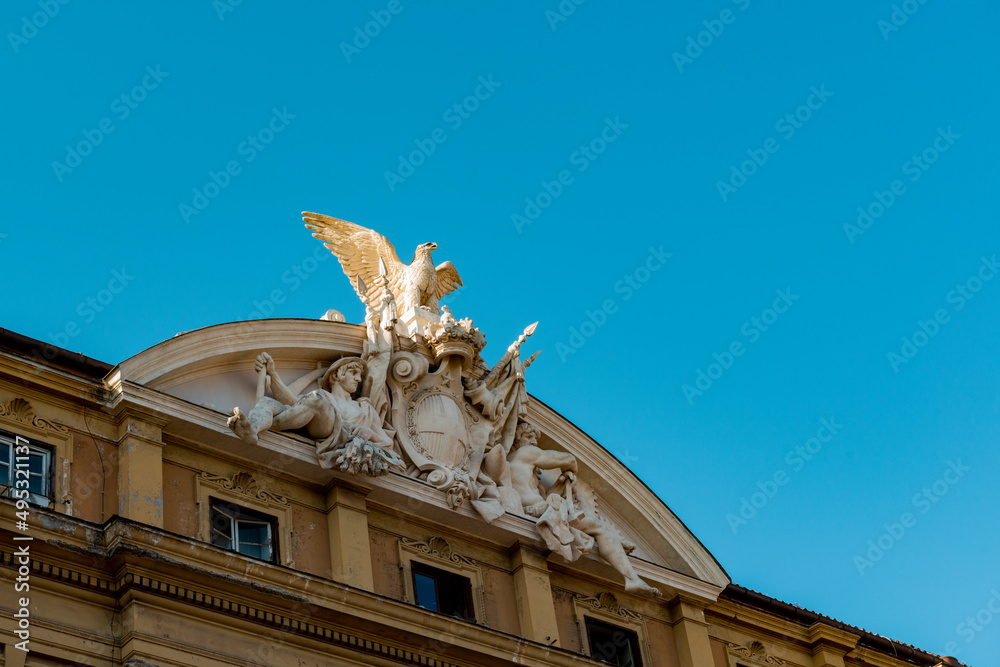 Obraz premium Rome, Italy - October 01 2019: Close up of the roof of the Italian Cassa Depositi e prestiti in Rome, with statues