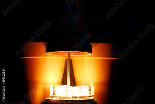 tealight stove decorated with colourful spring symbols