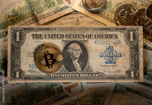 Bitcoin on old one Dollar banknote, silver certificate bill with Cryptocurrency photo