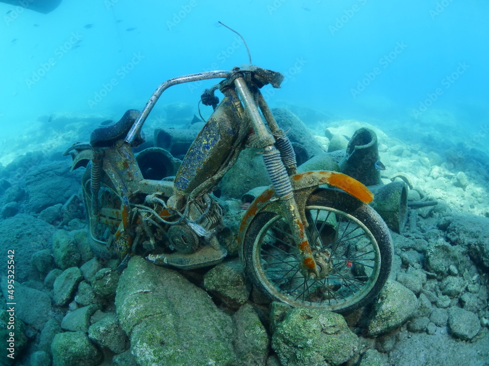 motorcycle bike underwater some fish around motorbike wreck underwater