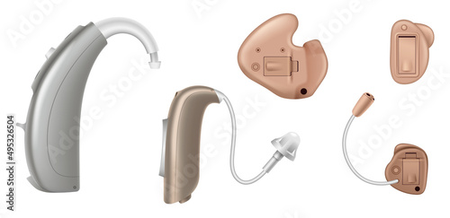 Hearing aid devices set isolated on white background. Different audiology equipment photo