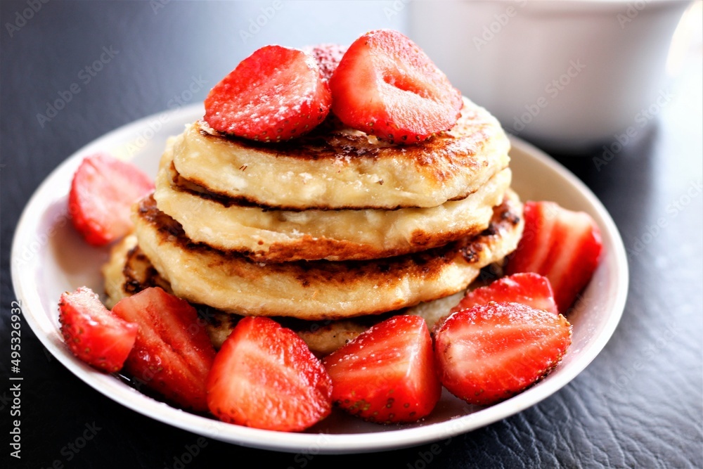 Closeup pancakes with strawberries food sweet breakfast dessert tasty pastry bakery red berry cup Closeup pancakes with strawberries food sweet breakfast dessert tasty pastry bakery red berry cup
