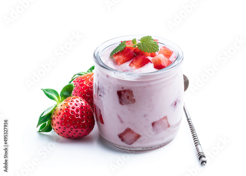 Homemade strawberry yogurt with fresh sliced berries isolated on white photo