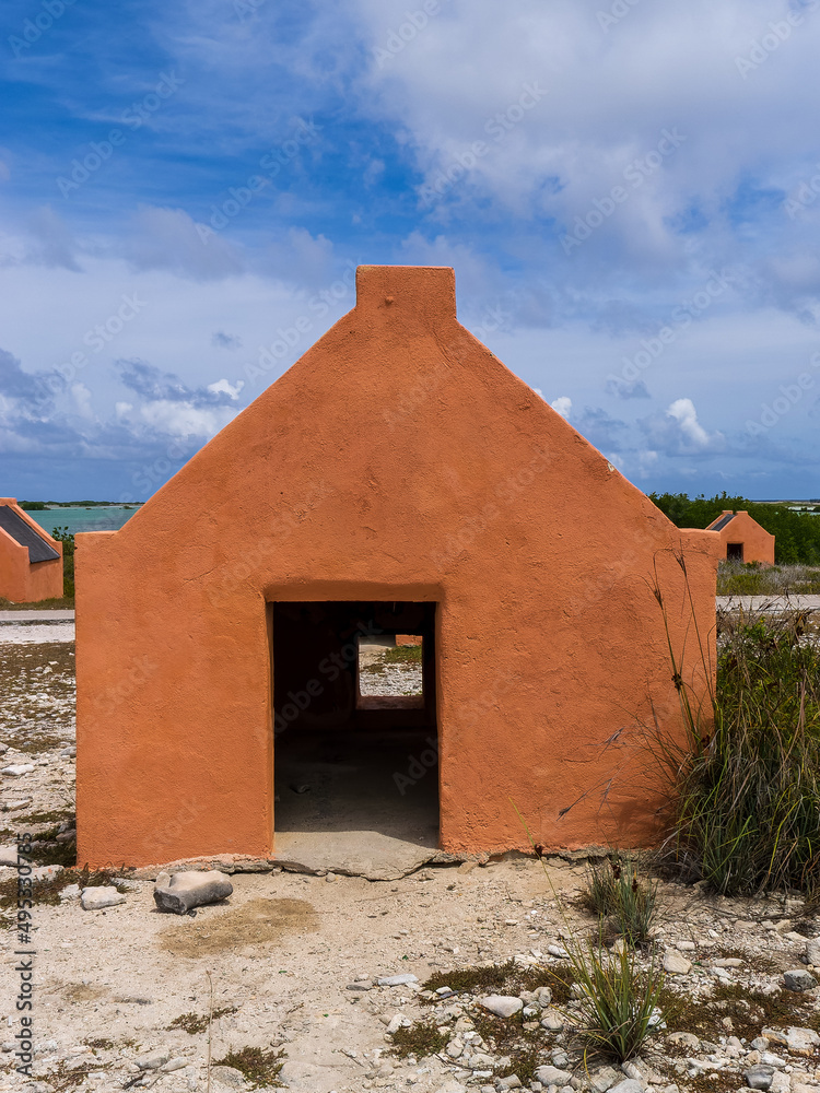 Single historic red slave hut in Bonaire, Caribbean Single historic red slave hut in Bonaire, Caribbean