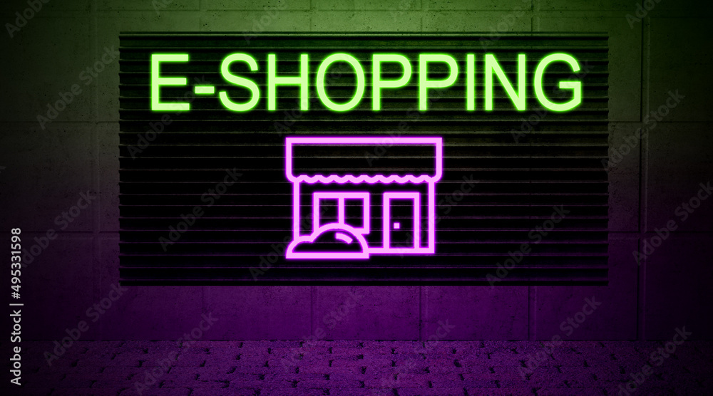 neon sign with message E-SHOPPING on a brick wall