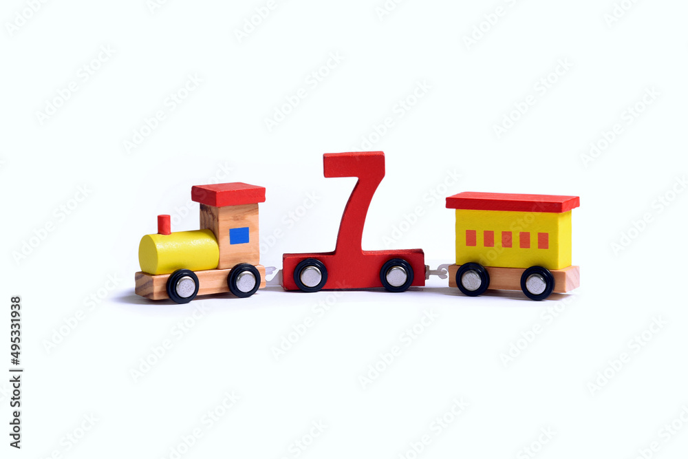 Very colorful toy wooden train with the number seven. Love and happiness birthday celebration, performance illustration, online educational toy. early learning Very colorful toy wooden train with the number seven. Love and happiness birthday celebration, performance illustration, online educational toy. early learning