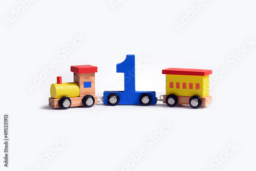 Very colorful toy wooden train with the number one. Love and happiness birthday celebration, performance illustration, online educational toy. early learning © Harold