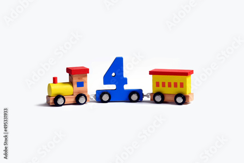 Very colorful toy wooden train with the number four. Love and happiness birthday celebration, performance illustration, online educational toy. early learning © Harold