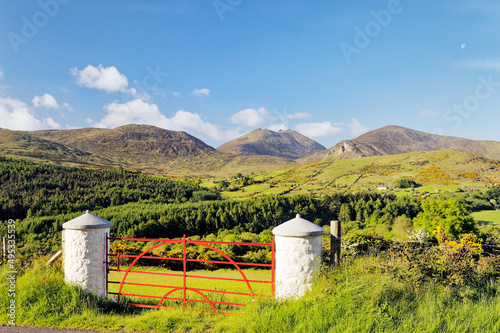 The Mourne Mountains, County Down, Northern Ireland. South over the Trassey Valley and Tollymore Forest Park to Slieve Bearnagh photo