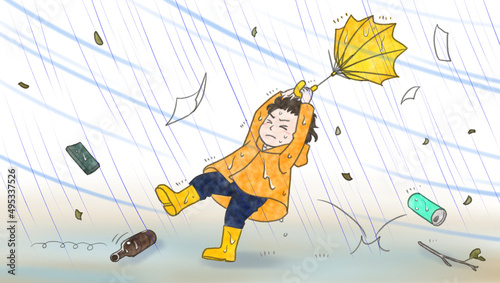 A boy almost blown over by the stormy wind