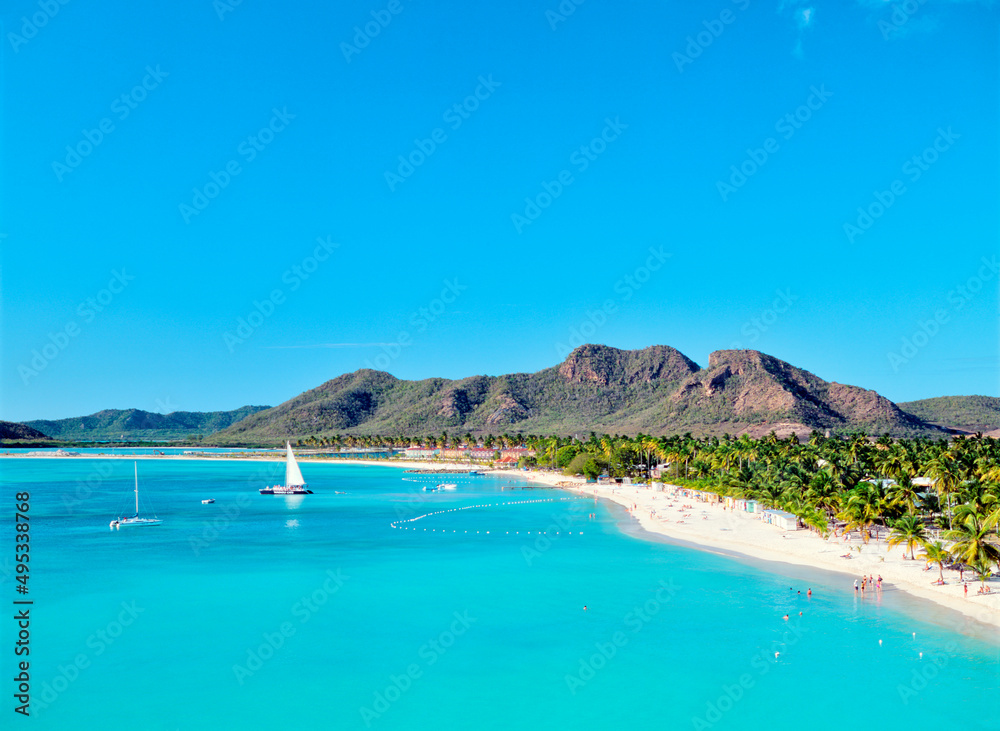Antigua. North from Coco Beach over Valley Church Bay and Lignum Vitae Bay to Jolly Harbour on west coast of Caribbean island