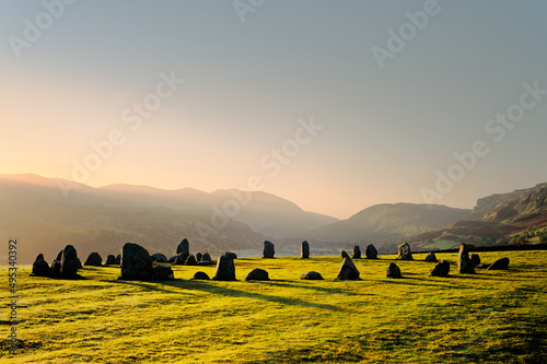 Castlerigg prehistoric stone circle near Keswick, in Lake District National Park, Cumbria, England. Midsummer sunrise looking south