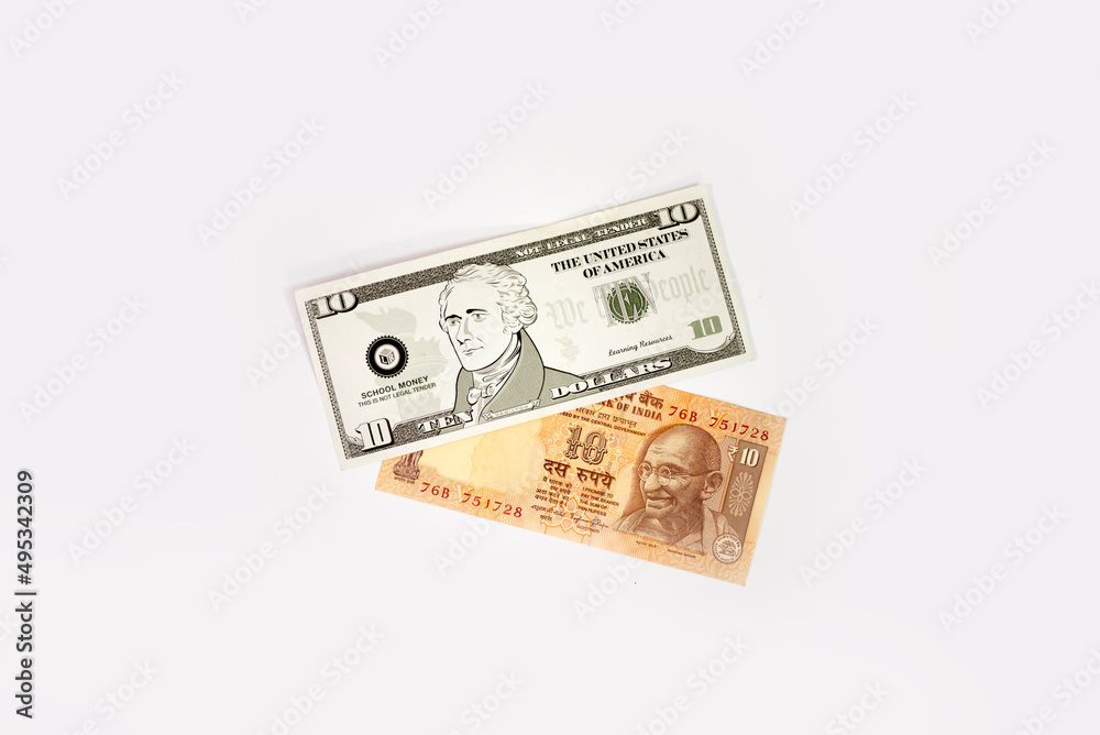 US dollar and Indian rupees banknote isolated on white background. US dollar and Indian rupees banknote isolated on white background.