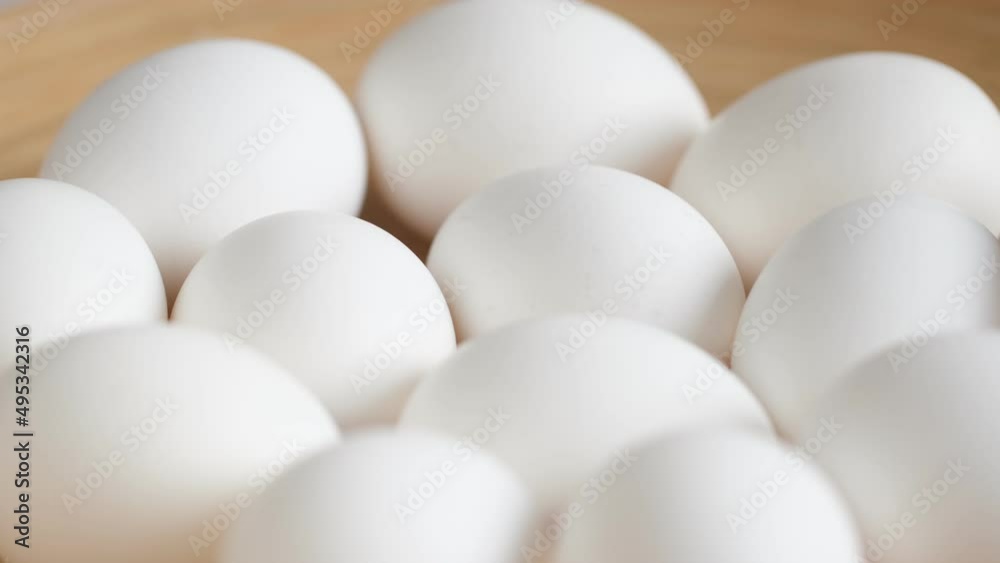 Chicken egg, rotation shot, Chicken fresh raw eggs.Healthy fresh food ingredients for breakfast. Animal products. Grocery. Chicken farm fresh eggs Chicken egg, rotation shot, Chicken fresh raw eggs.Healthy fresh food ingredients for breakfast. Animal products. Grocery. Chicken farm fresh eggs