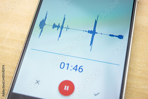 Dictaphone voice recording on smartphone. Microphone on a smartphone. photo