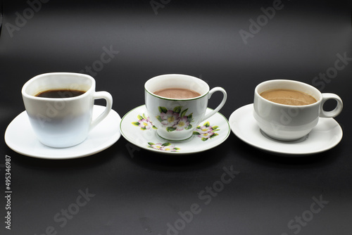 coffee mugs coasters Various designs, different sizes, black background,Include Clipping Path.