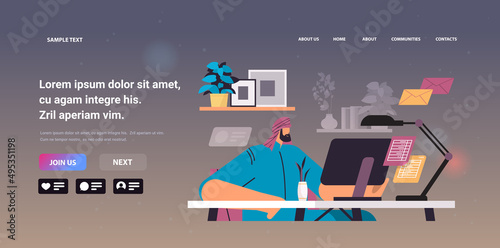 arab businessman freelancer sitting at workplace arabic business man looking in computer monitor working process