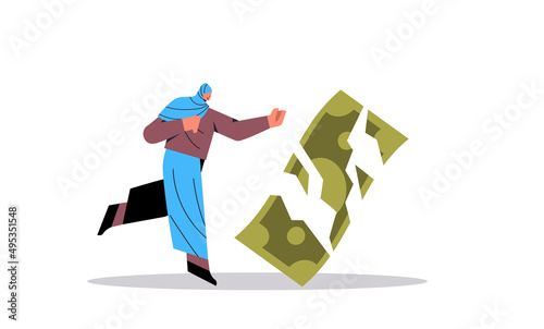 arab businesswoman with broken paper banknote financial crisis bankruptcy concept